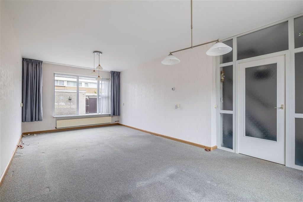 Tussenwoning te koop: Margrietstraat 7, Oostwold