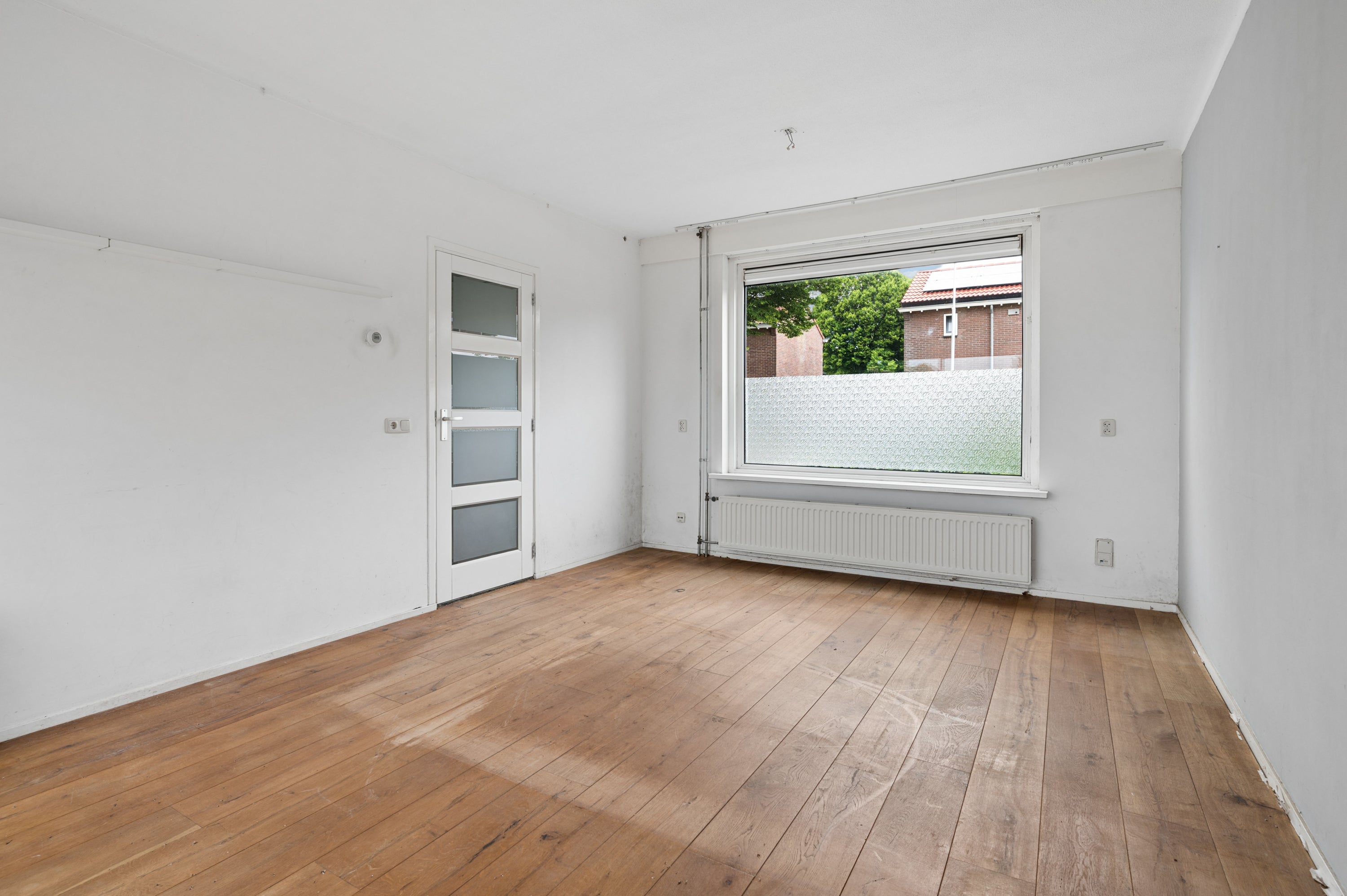 Tussenwoning te koop: Ranonkellaan 9, Ede