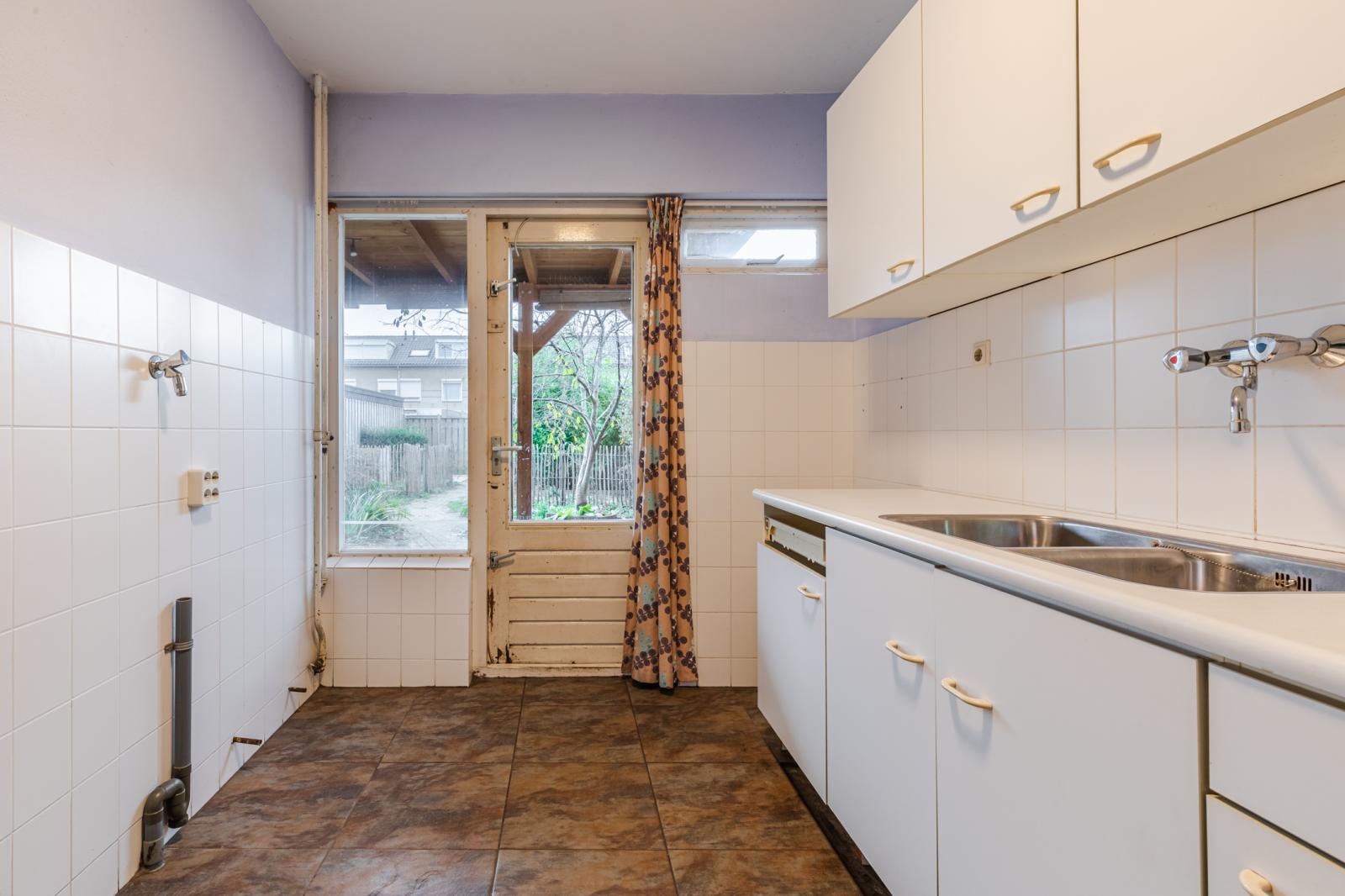 Tussenwoning te koop: De Ruijterstraat 11, Veghel