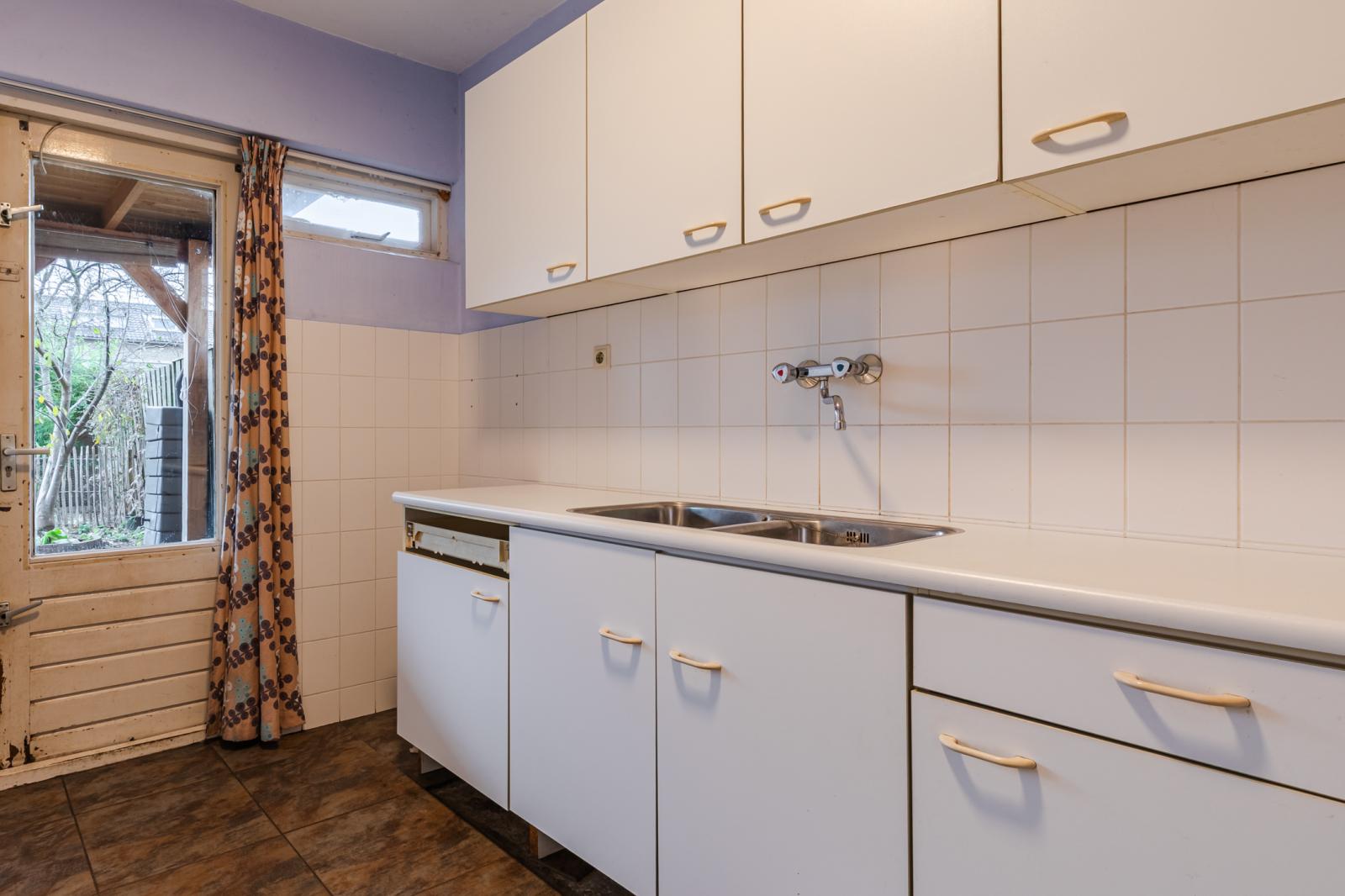Tussenwoning te koop: De Ruijterstraat 11, Veghel