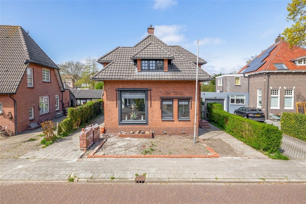 Vrijstaande woning te koop: E.E. Stolperlaan 4, Veendam