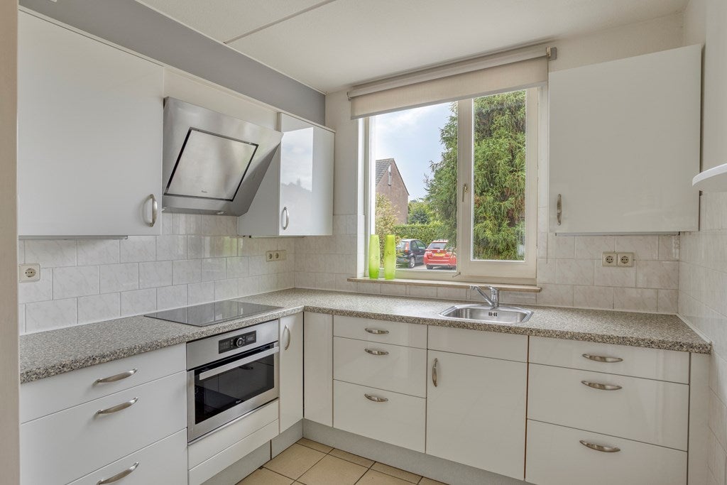 Tussenwoning te koop: Schuttersdreef 64, Heythuysen