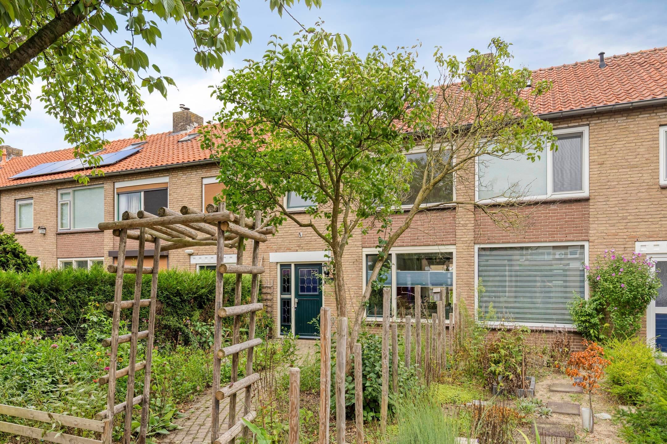 Tussenwoning te koop: Zwanensingel 63, Wijchen