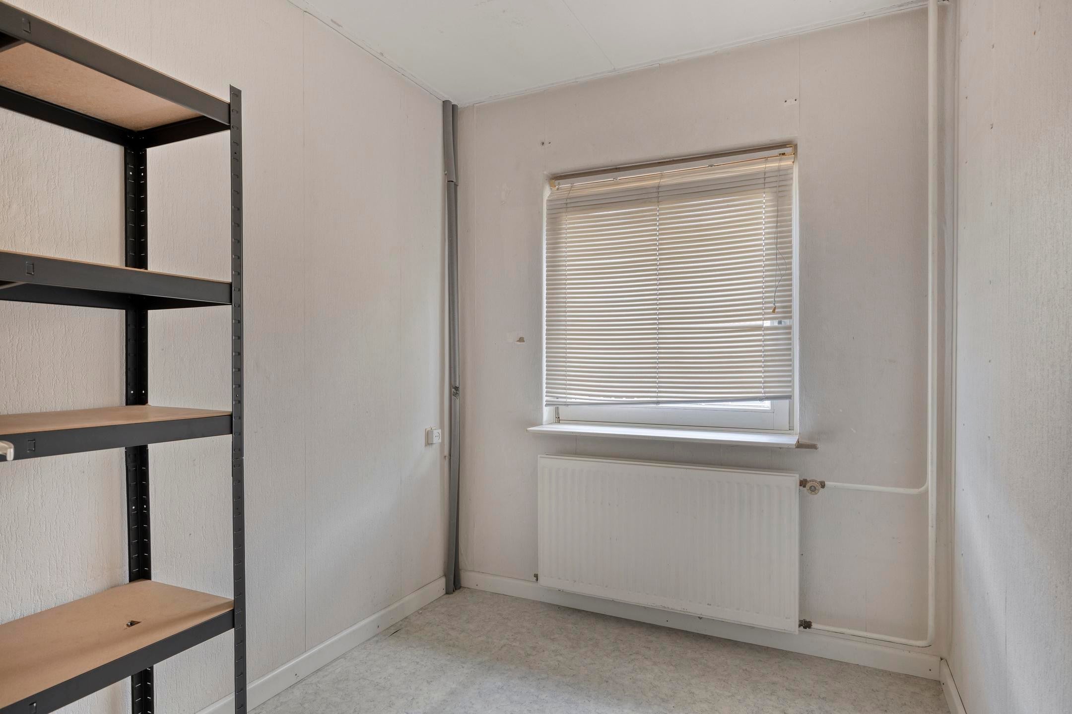 Tussenwoning te koop: Zwanensingel 63, Wijchen