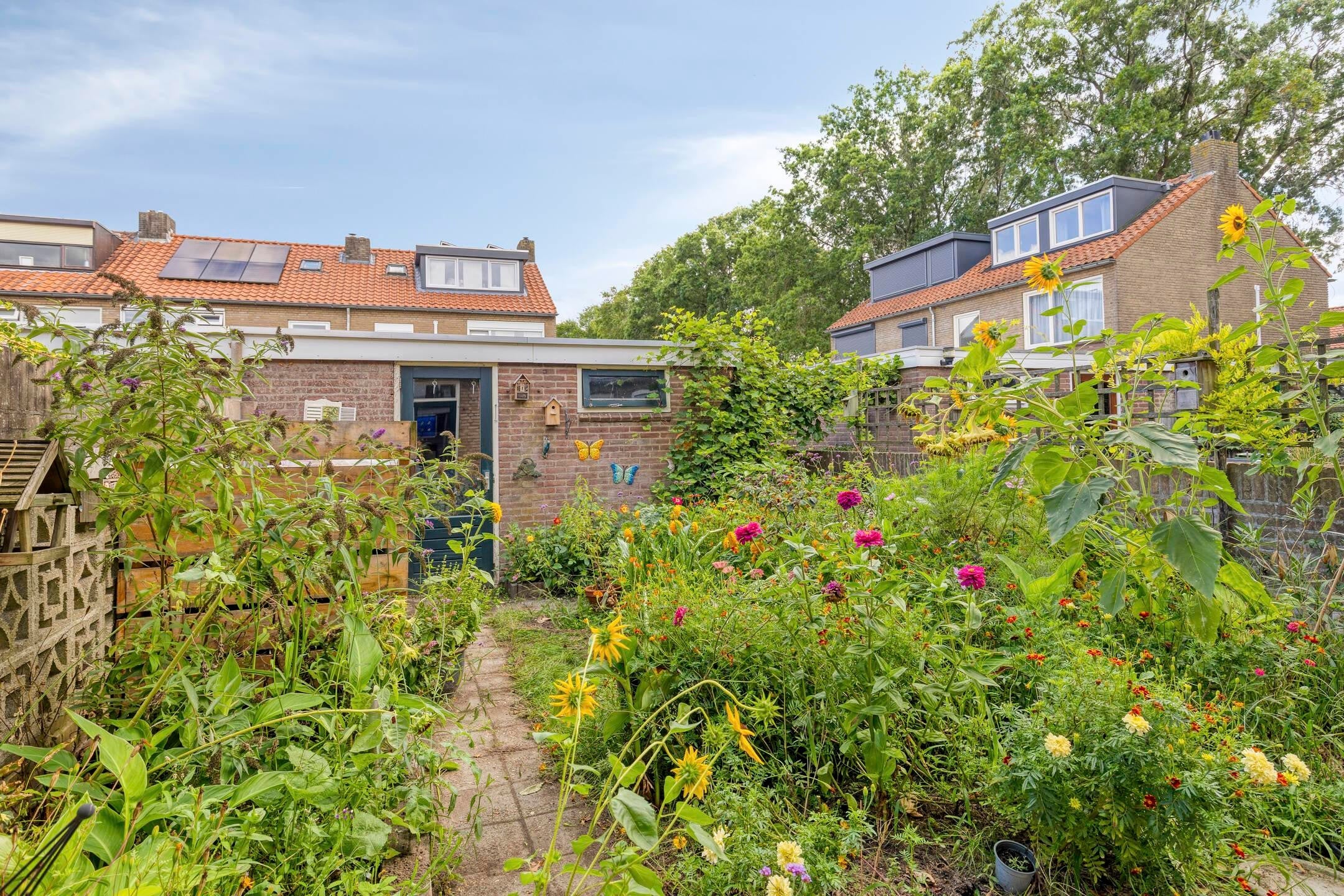 Tussenwoning te koop: Zwanensingel 63, Wijchen