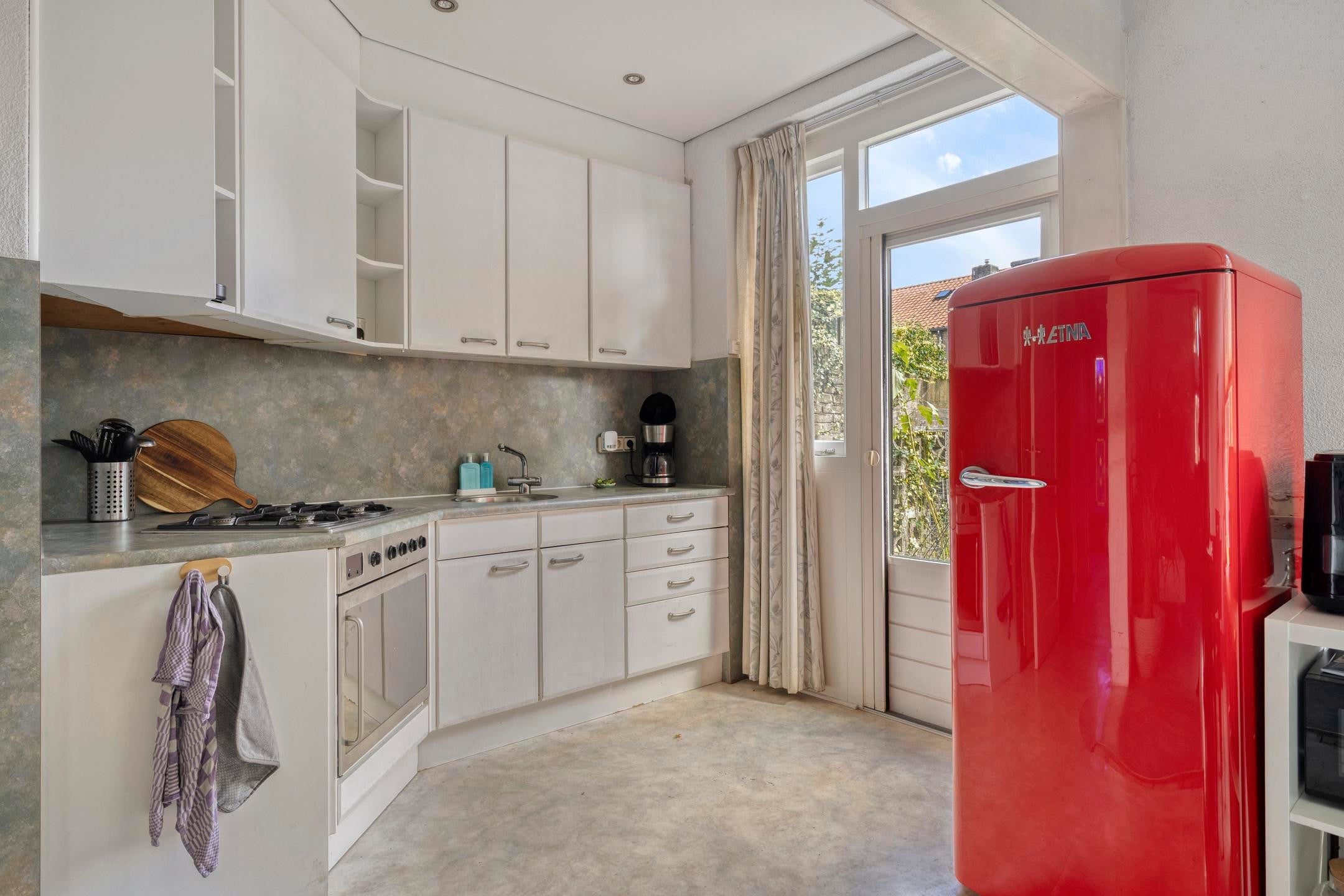 Tussenwoning te koop: Zwanensingel 63, Wijchen