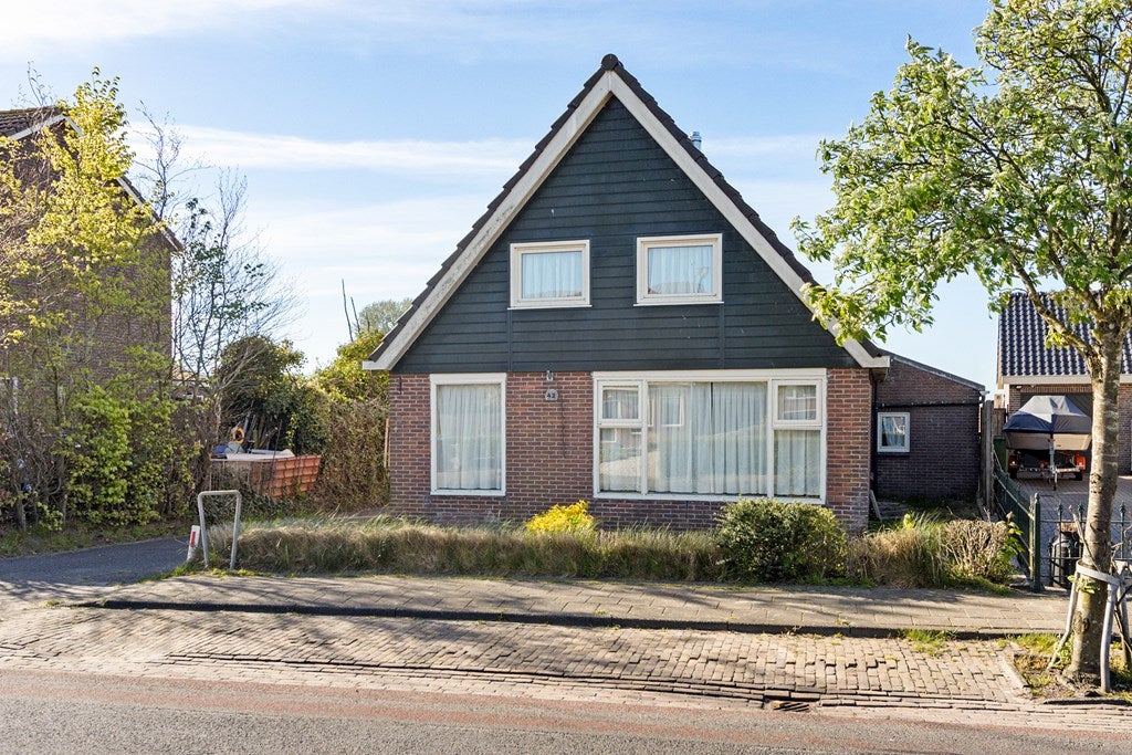 Huis Herenweg 42 in Oosterzee