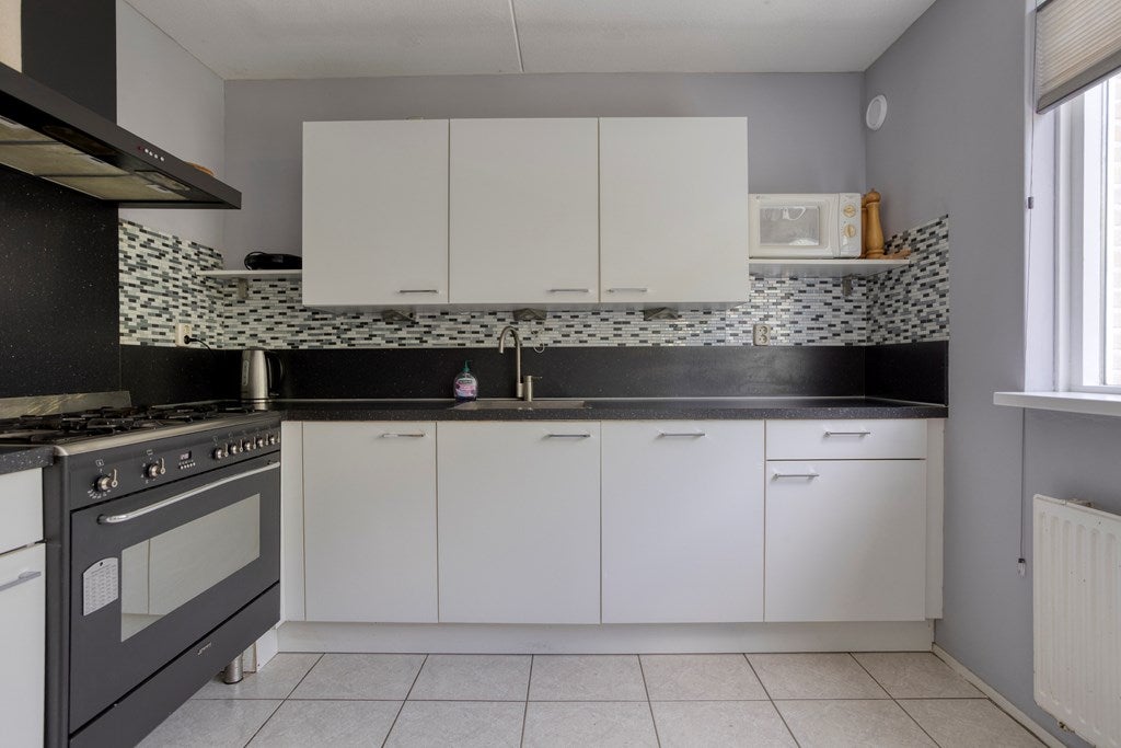 Tussenwoning te koop: Middachtenlaan 46, Almere