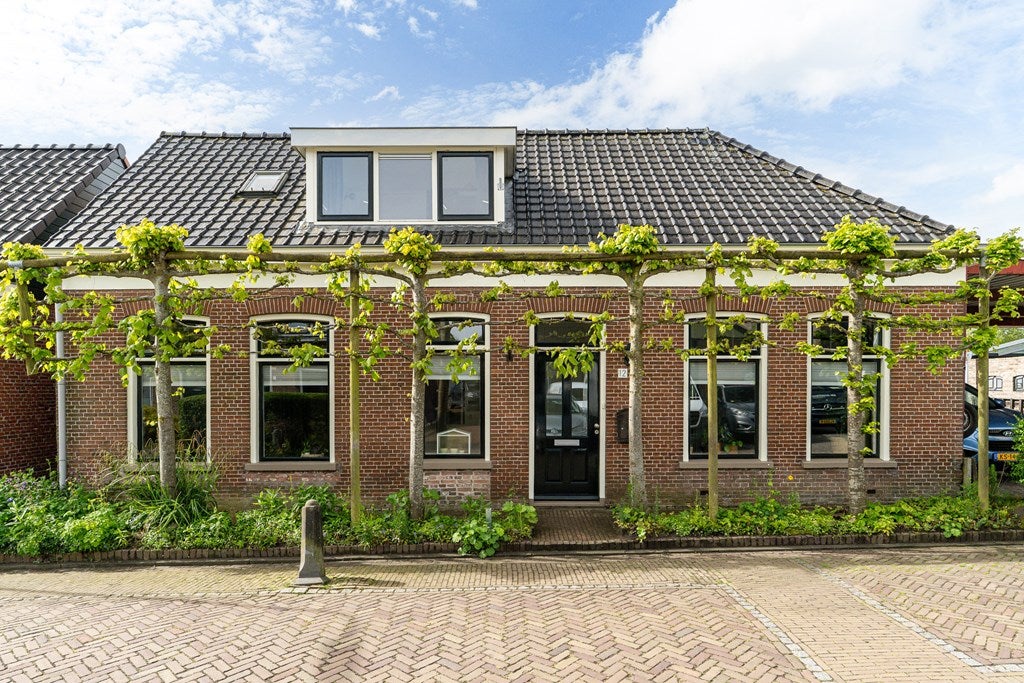 Huis Hommemastrjitte 12 in Dronryp