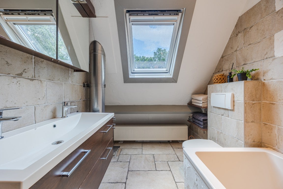Tussenwoning te koop: Kastanjelaan 28, Halsteren