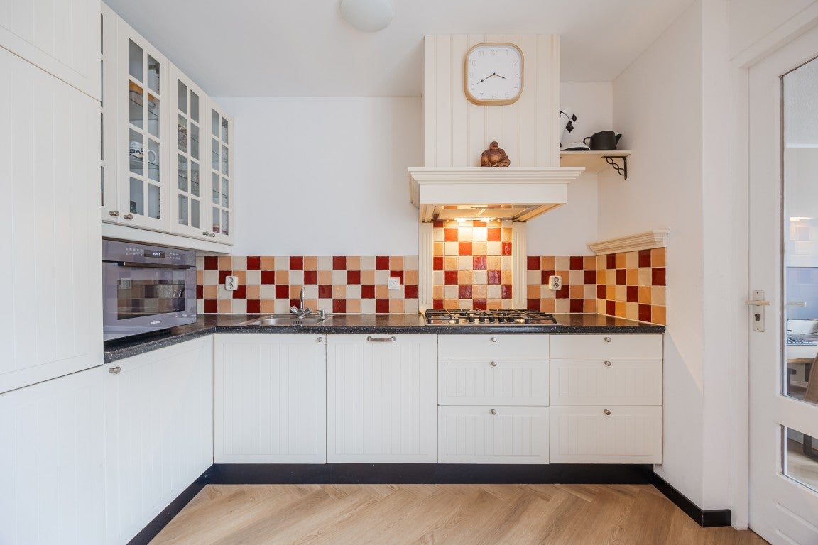 Tussenwoning te koop: Kastanjelaan 28, Halsteren