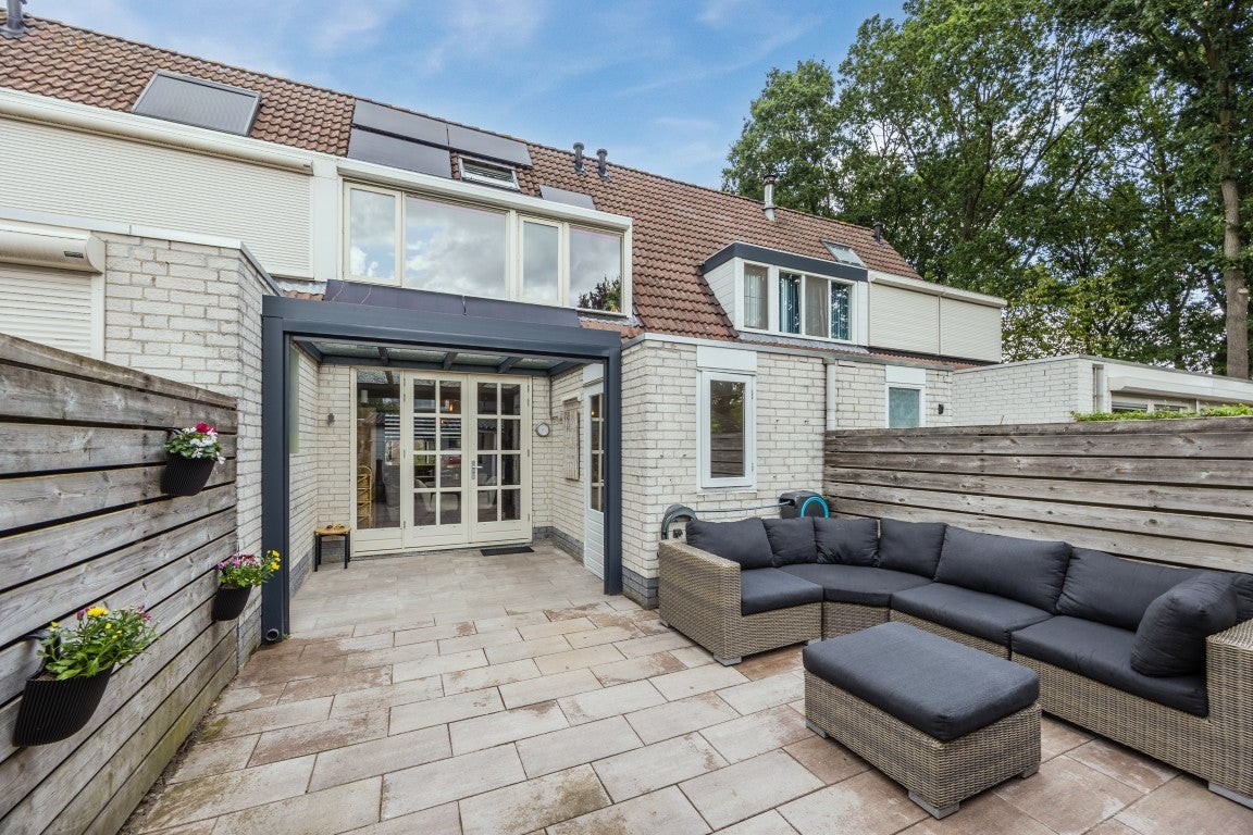 Tussenwoning te koop: Kastanjelaan 28, Halsteren