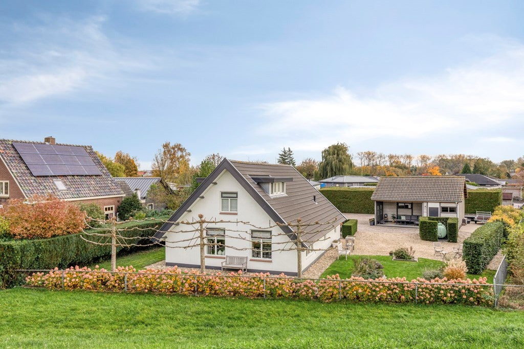 Huis Rijnbandijk 113 in Maurik