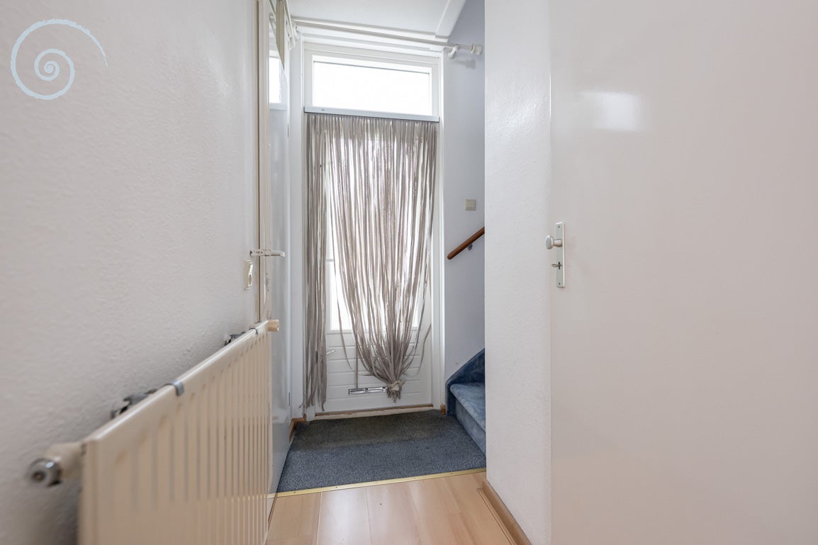 Tussenwoning te koop: Pimpelmees 26, Sommelsdijk