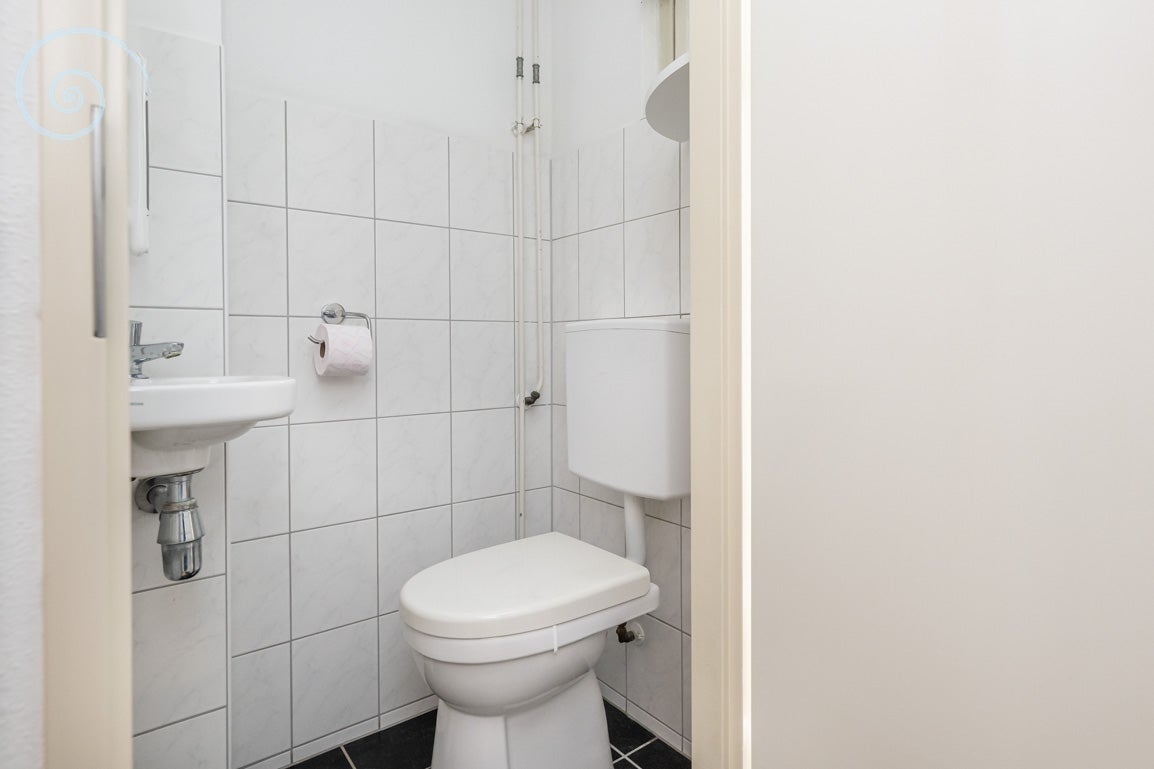 Tussenwoning te koop: Pimpelmees 26, Sommelsdijk