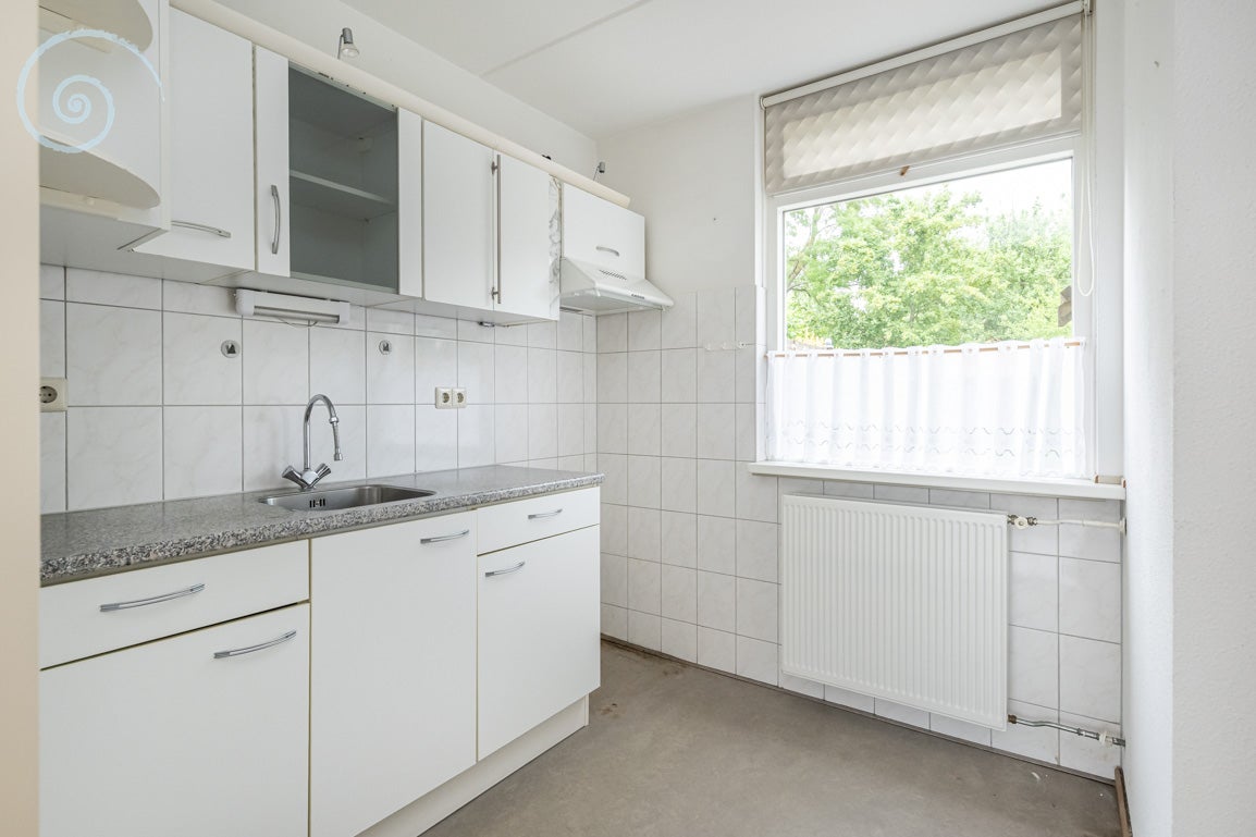 Tussenwoning te koop: Pimpelmees 26, Sommelsdijk