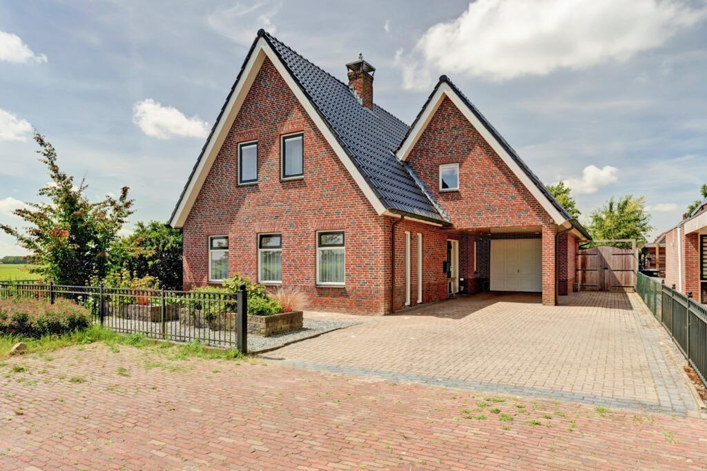 Huis Oostelijke Koppelveenweg 12 in Emmer-Compascuum