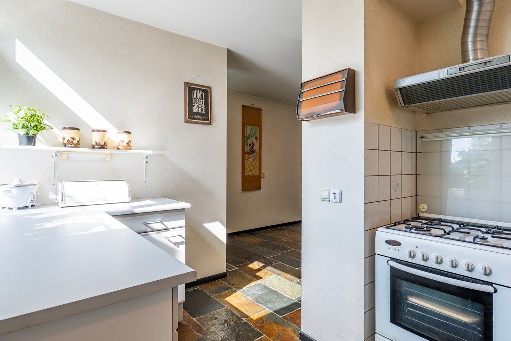 Tussenwoning te koop: Dopheidestraat 23, Lisserbroek