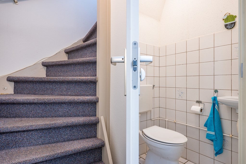 Tussenwoning te koop: Dopheidestraat 23, Lisserbroek