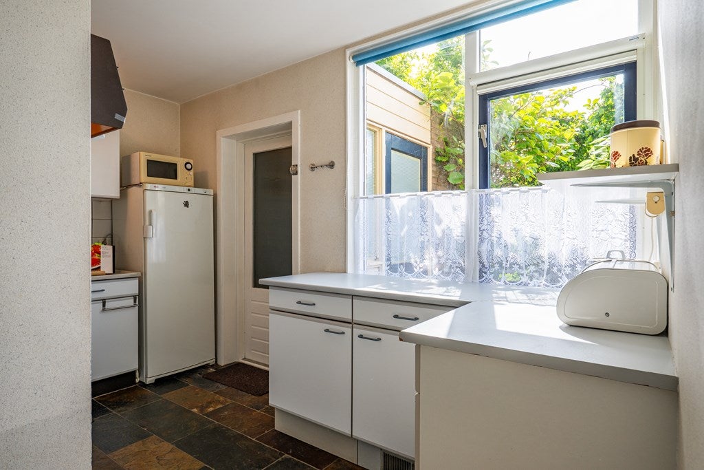 Tussenwoning te koop: Dopheidestraat 23, Lisserbroek