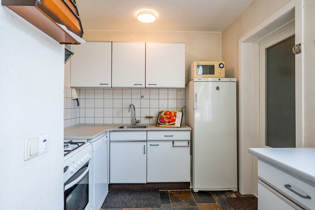 Tussenwoning te koop: Dopheidestraat 23, Lisserbroek
