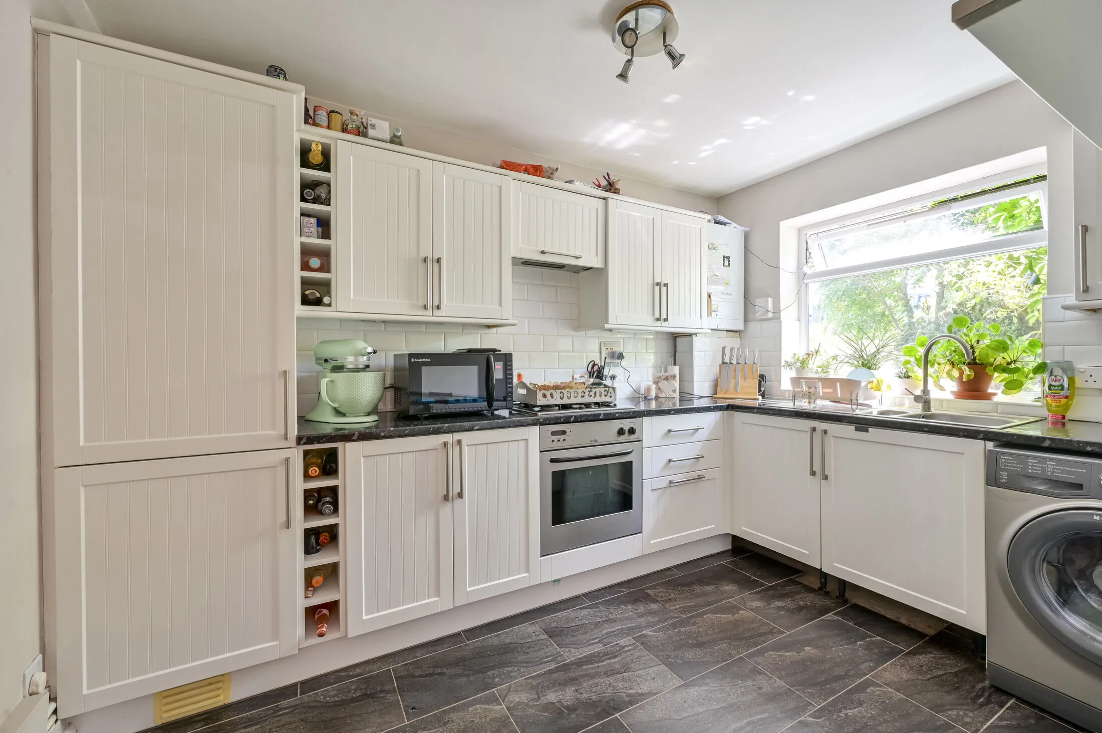 Flat Haydon Park Road in Greater London
