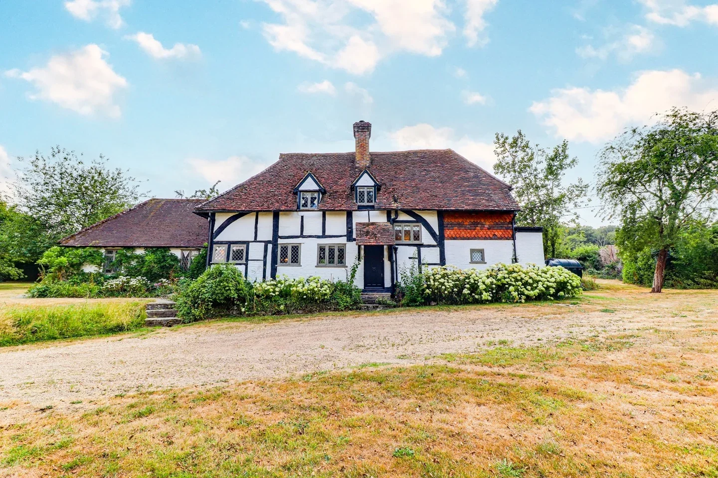 House Logmore Lane in Mole Valley