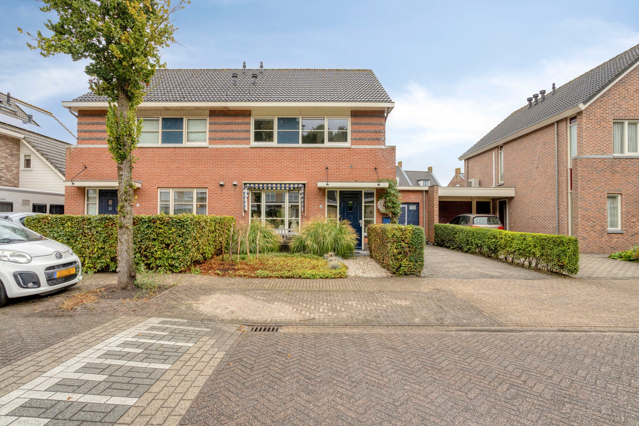 Tussenwoning te koop: Olmenstraat 24, Halsteren
