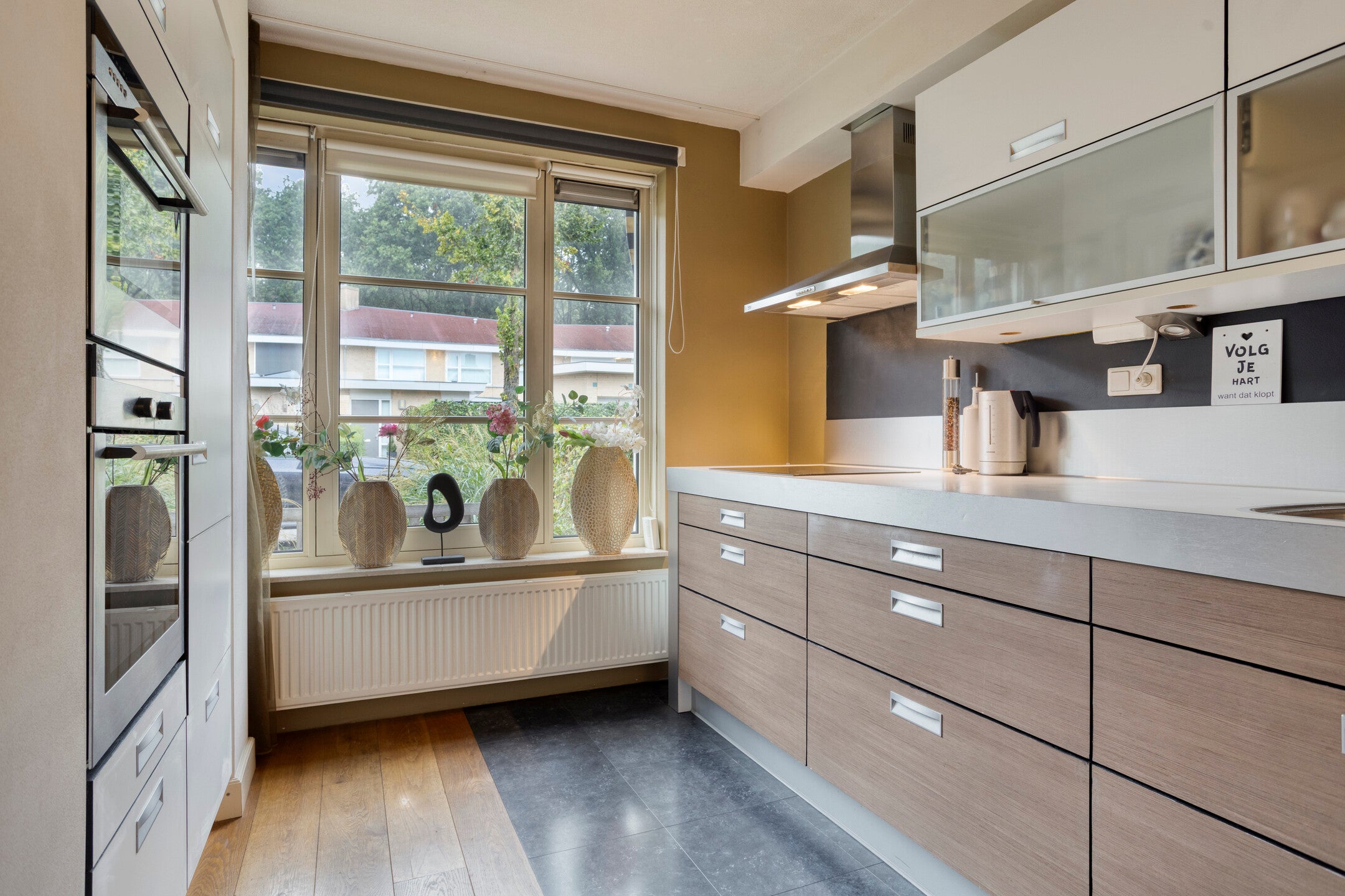 Tussenwoning te koop: Olmenstraat 24, Halsteren