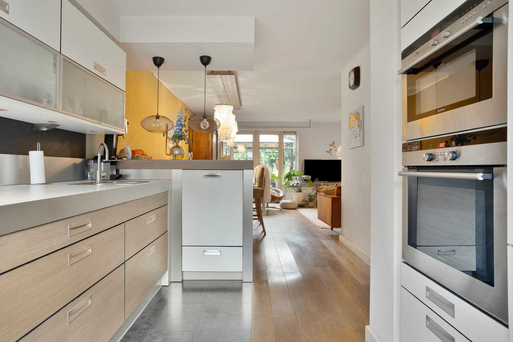 Tussenwoning te koop: Olmenstraat 24, Halsteren