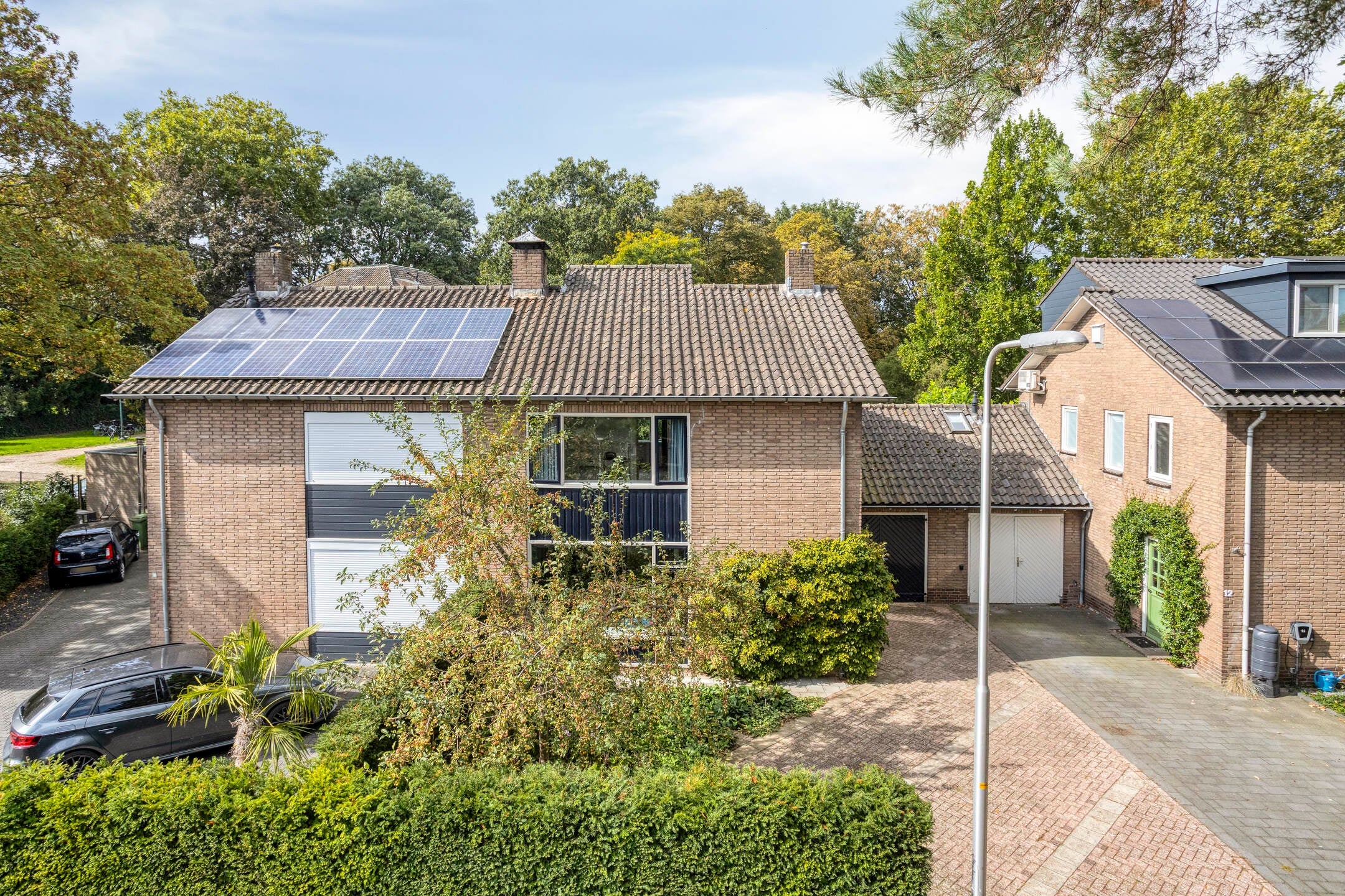 Tussenwoning te koop: Kuijperstraat 14, Elst