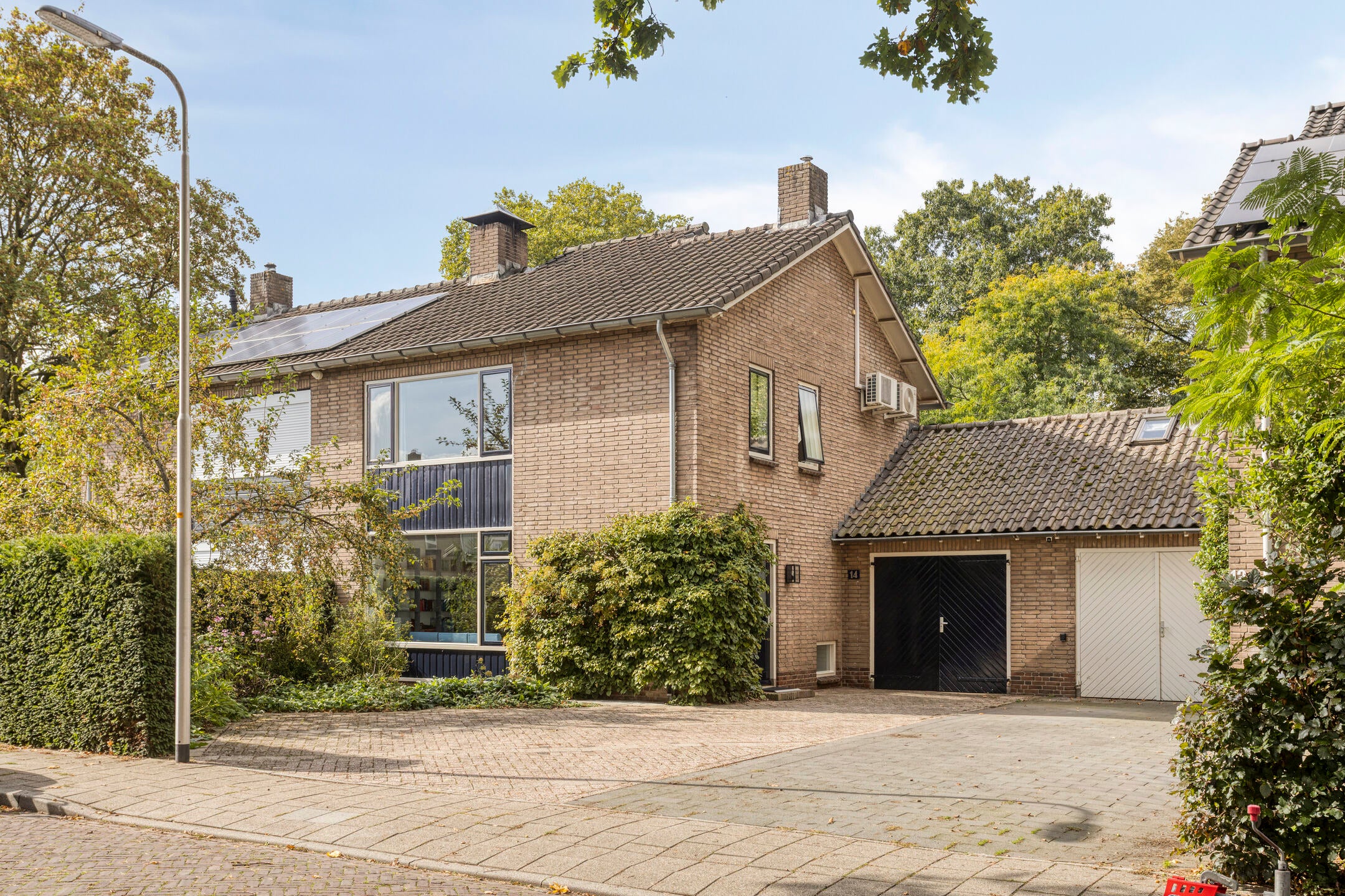 Tussenwoning te koop: Kuijperstraat 14, Elst