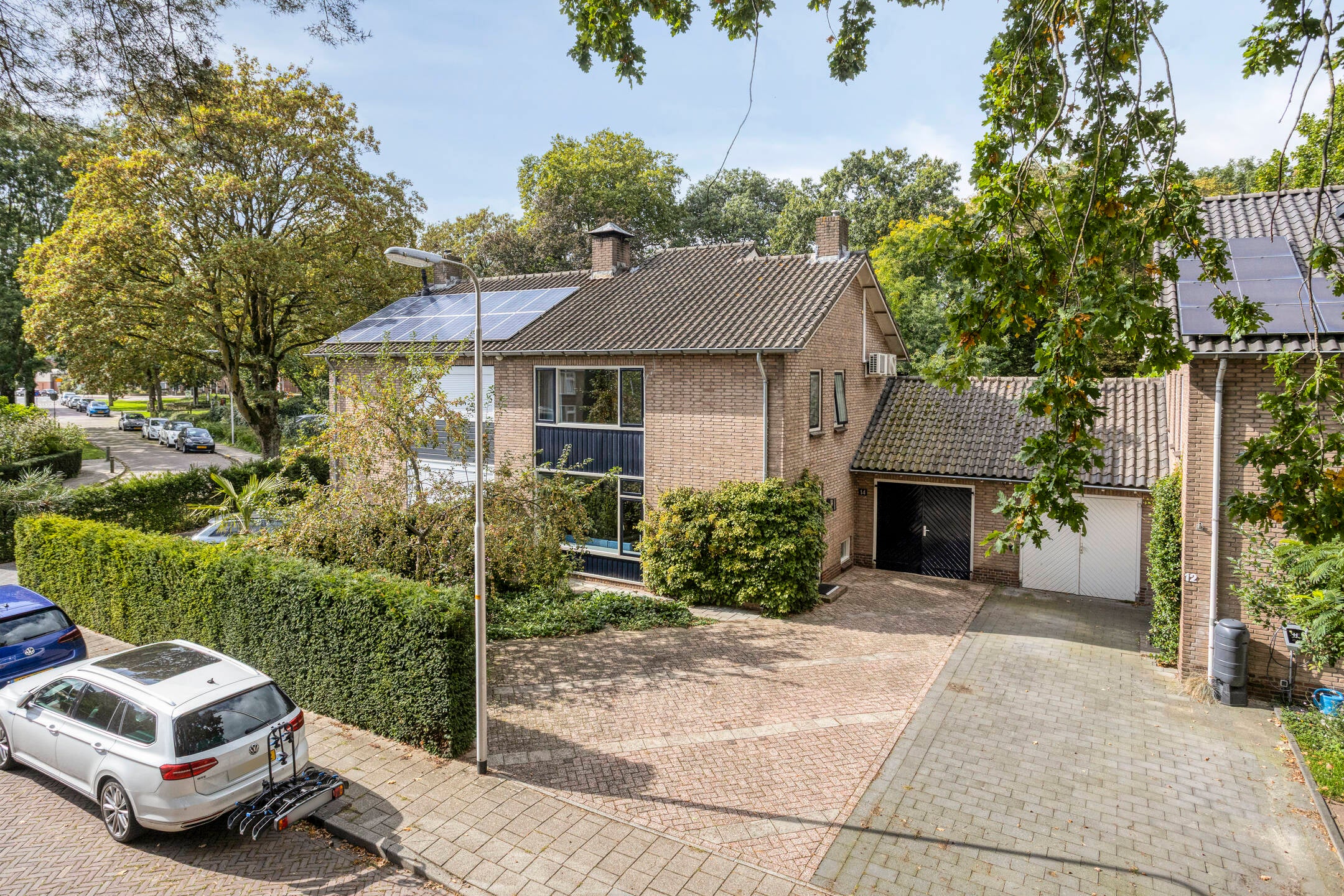 Tussenwoning te koop: Kuijperstraat 14, Elst