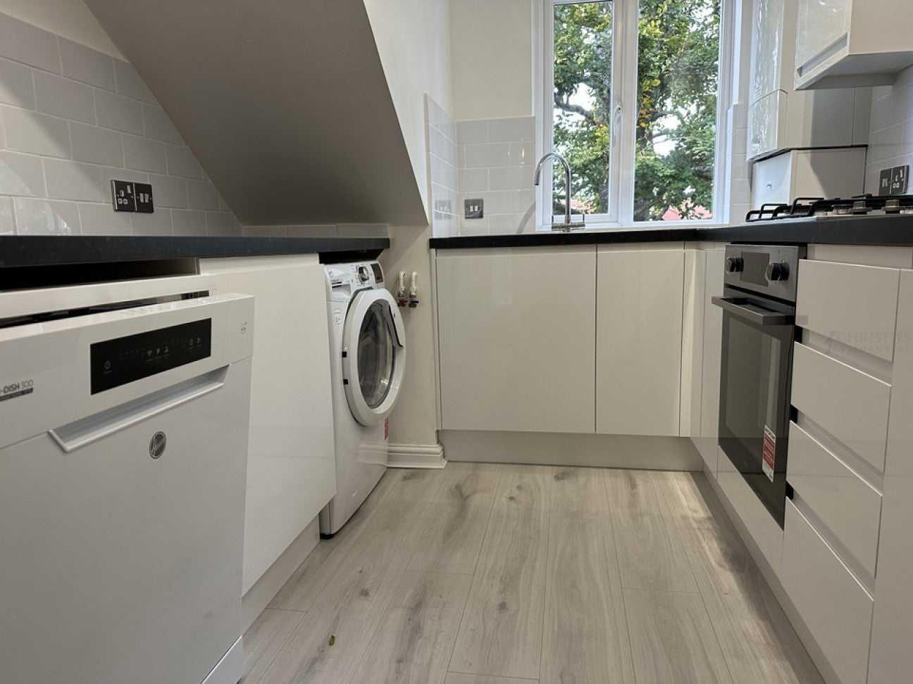 Flat Epsom Road in Mole Valley