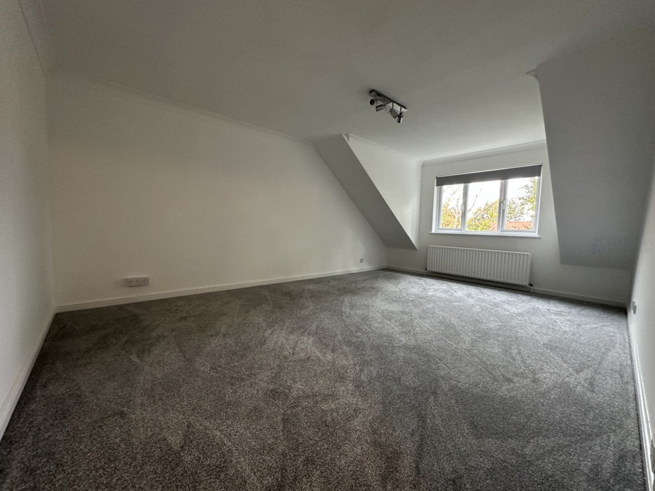Flat Epsom Road in Mole Valley