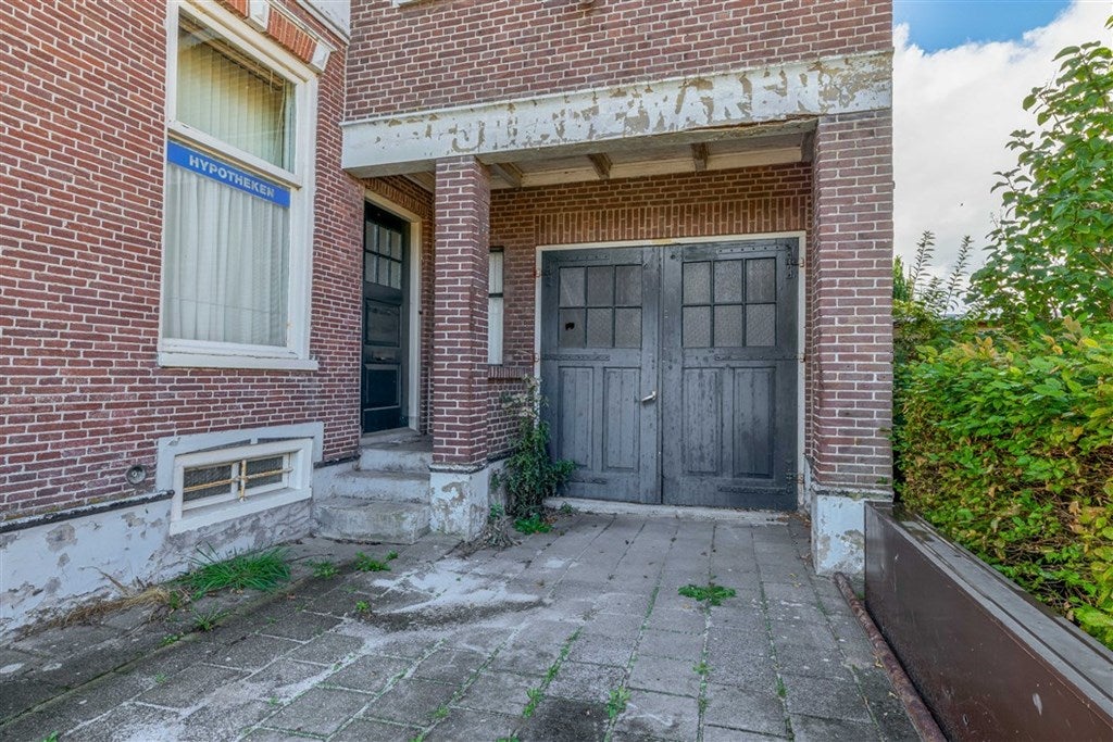 Vrijstaande woning te koop: Poststraat 60, Wildervank