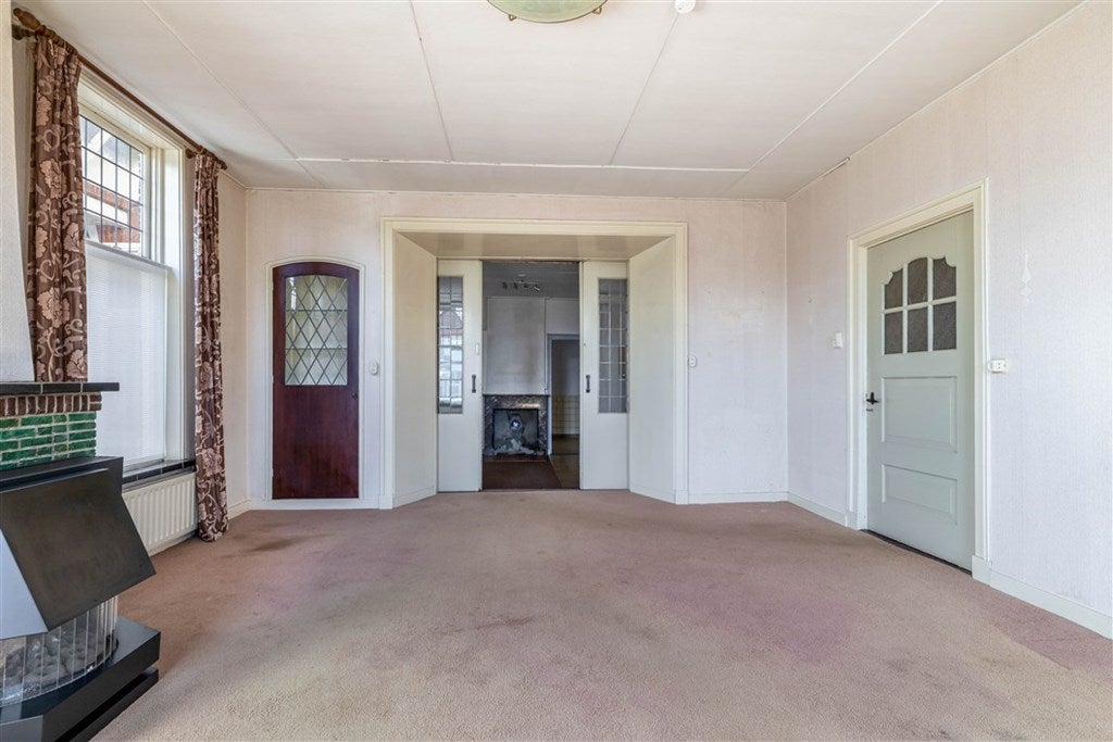 Vrijstaande woning te koop: Poststraat 60, Wildervank