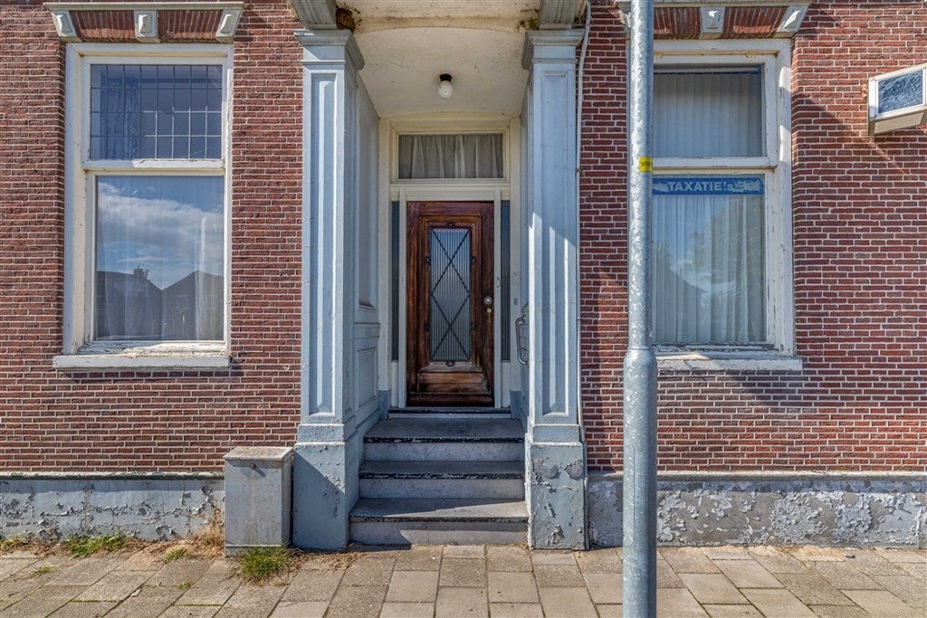 Vrijstaande woning te koop: Poststraat 60, Wildervank