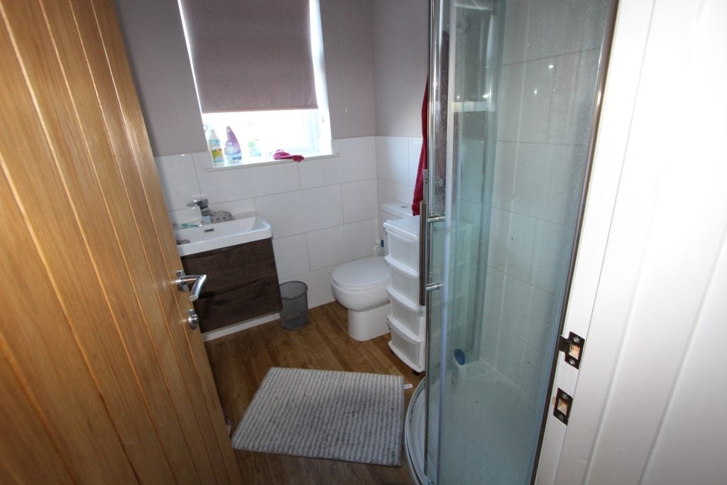 Room Downs Road in Willingdon and Jevington