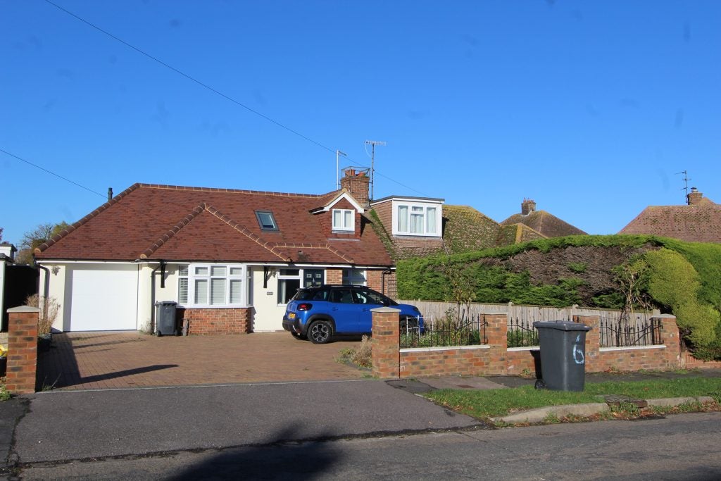 Room Downs Road in Willingdon and Jevington