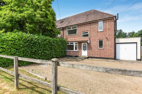 House Sandhills Lane in Borough of Runnymede