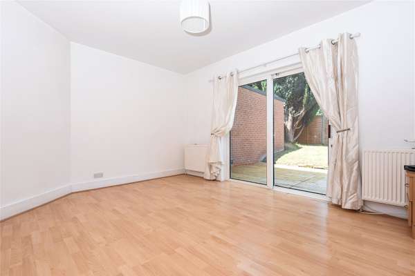 House Sandhills Lane in Borough of Runnymede