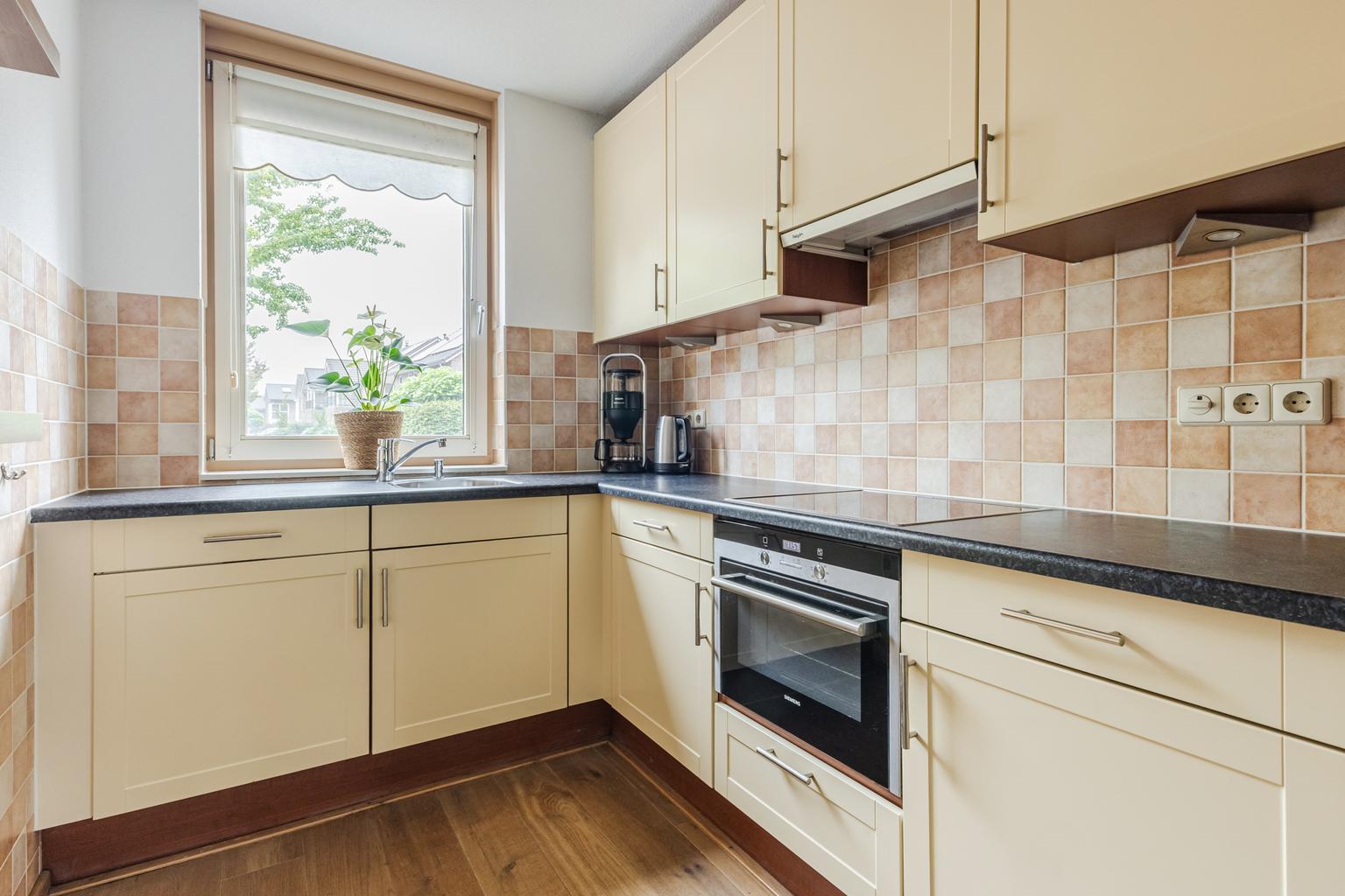 Tussenwoning te koop: Schoenmakersloot 26, Broek Op Langedijk