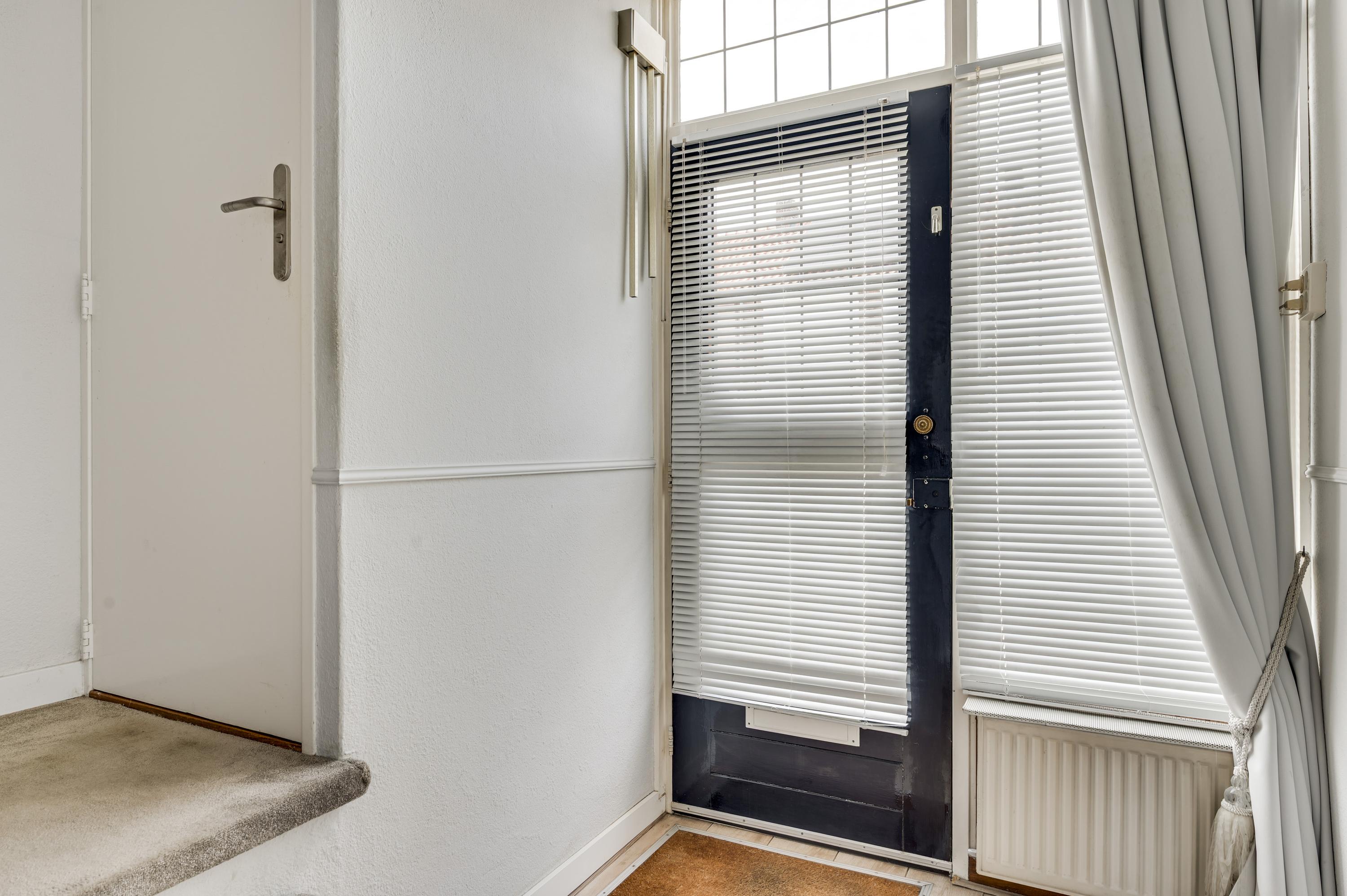 Tussenwoning te koop: Kapittelstraat 22, Weert