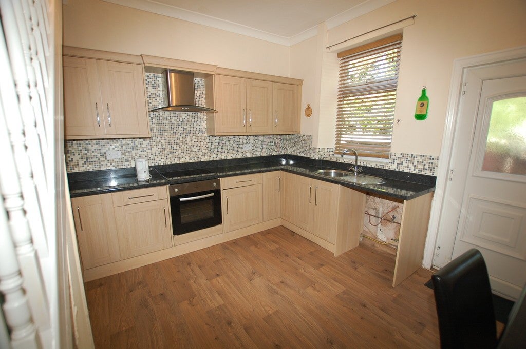 House Back Ivanhoe Street in Farnworth