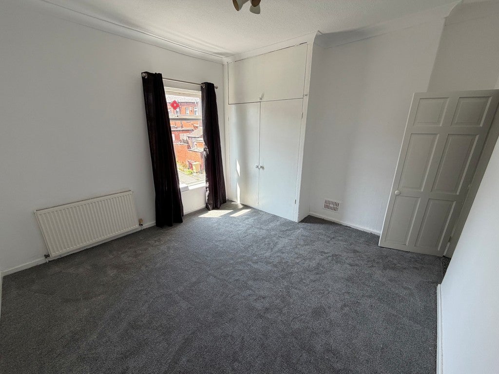 House Back Ivanhoe Street in Farnworth