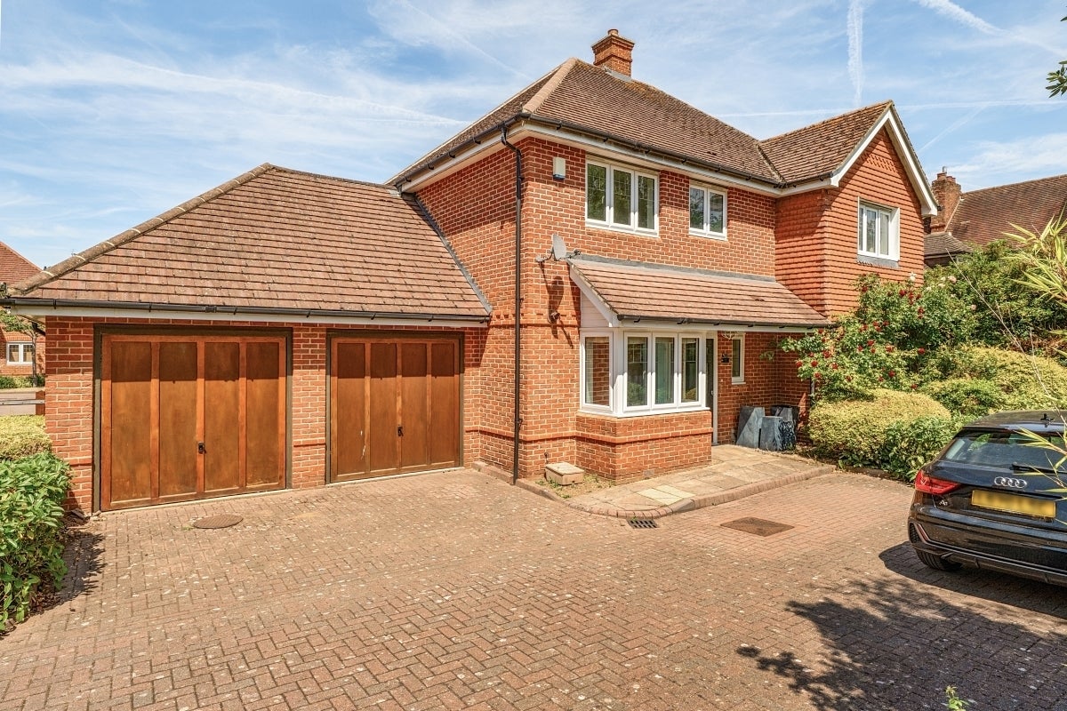 House Nower Close East in Mole Valley