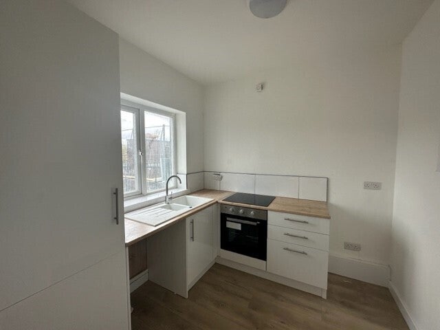 Flat Woodchurch Road in Prenton