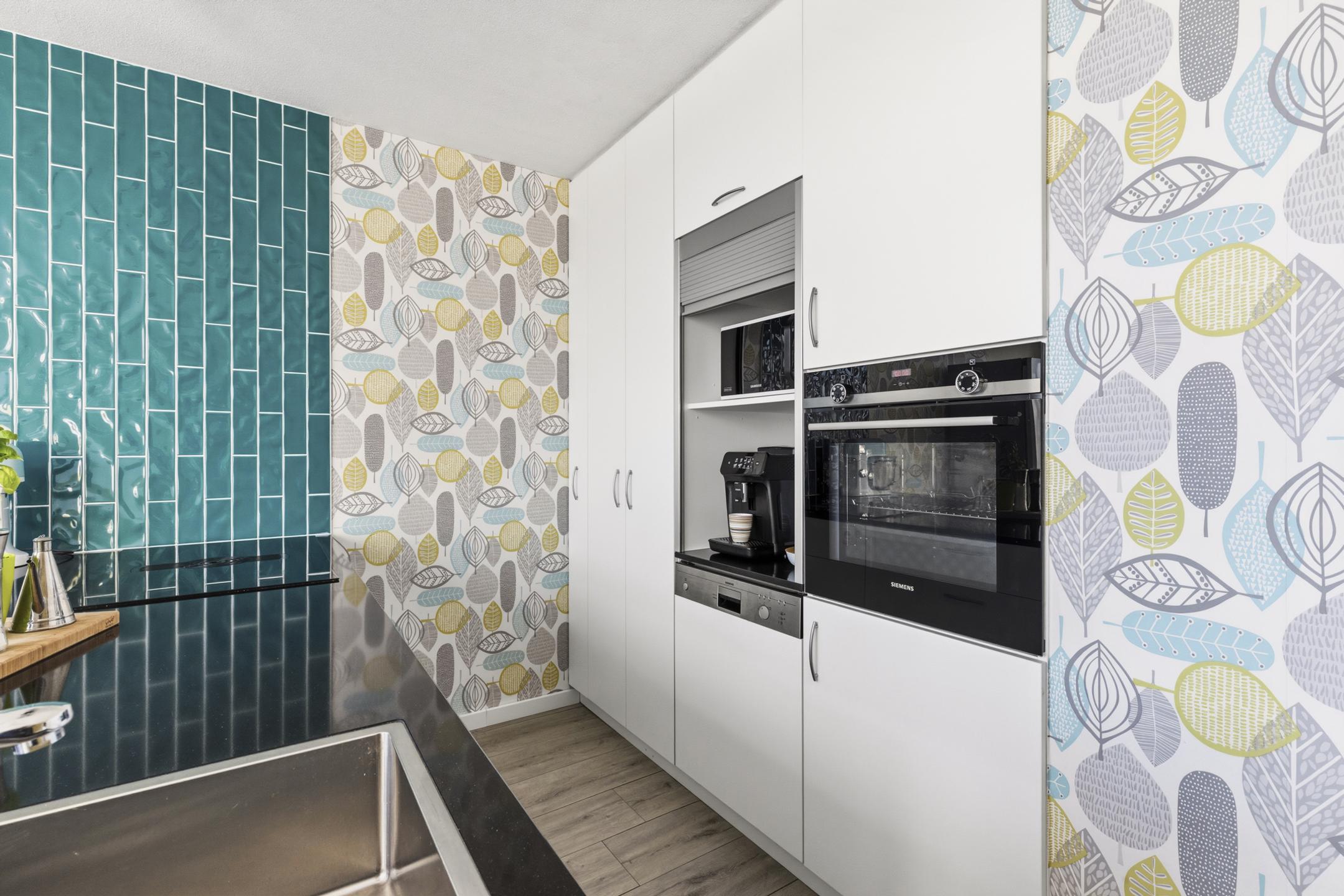Tussenwoning te koop: Aquamarin 105, Weesp