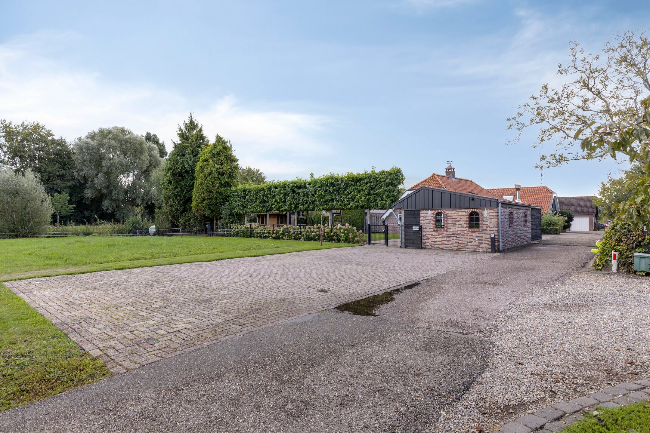 Twee-onder-één-kap te koop: Vrouwenweg 17, Nijkerkerveen